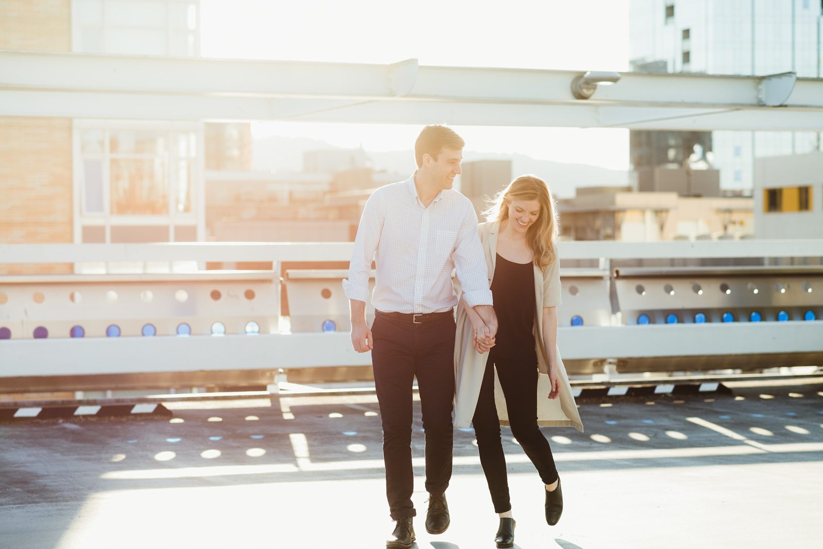Rooftop engagement session with stylish couple in downtown Portland, Oregon.