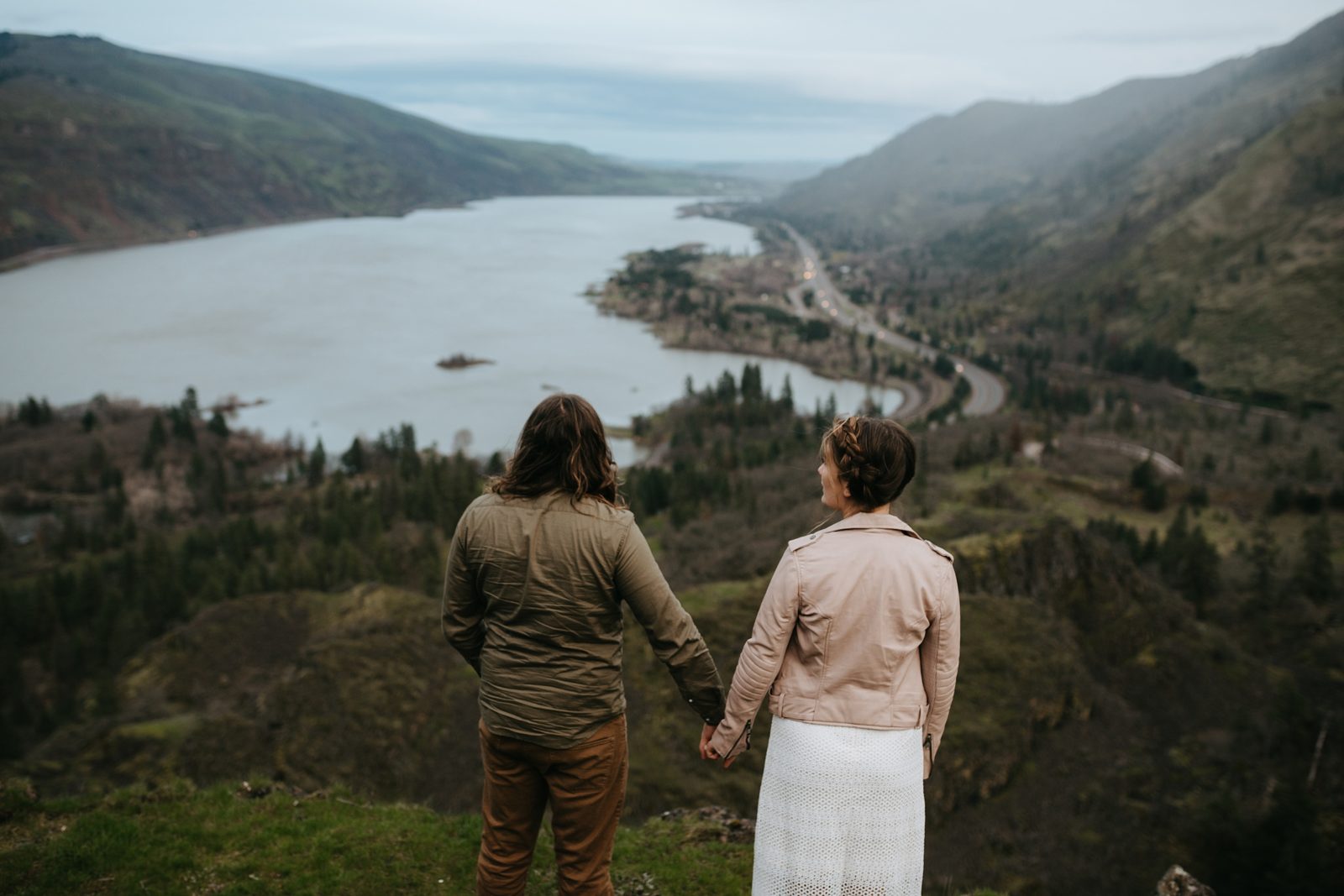 Elopement at Rowena Crest in the Columbia River Gorge. Bride is wearing pink leather jacket.