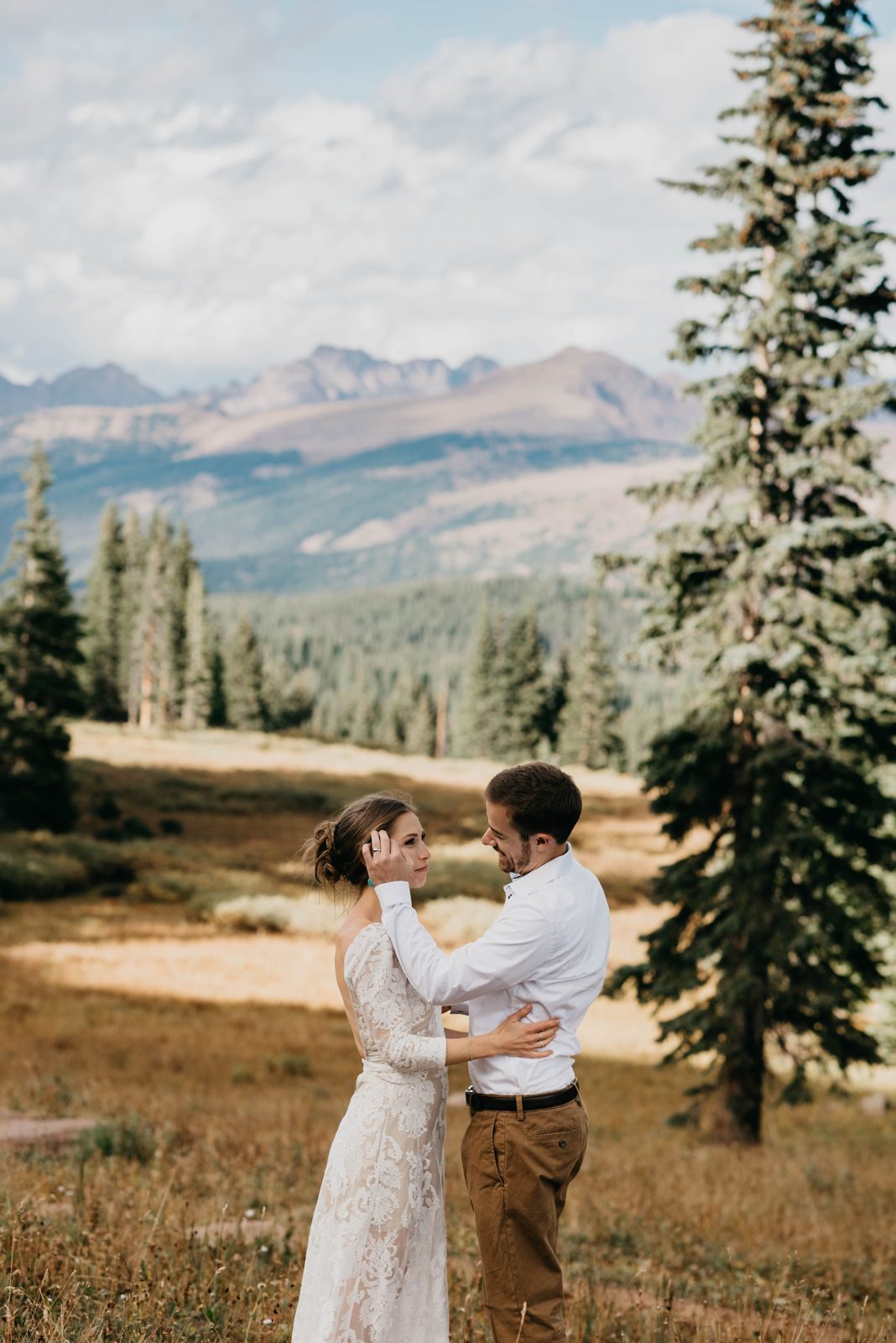 Day after wedding portraits for couple on the mountainside of Vail, Colorado