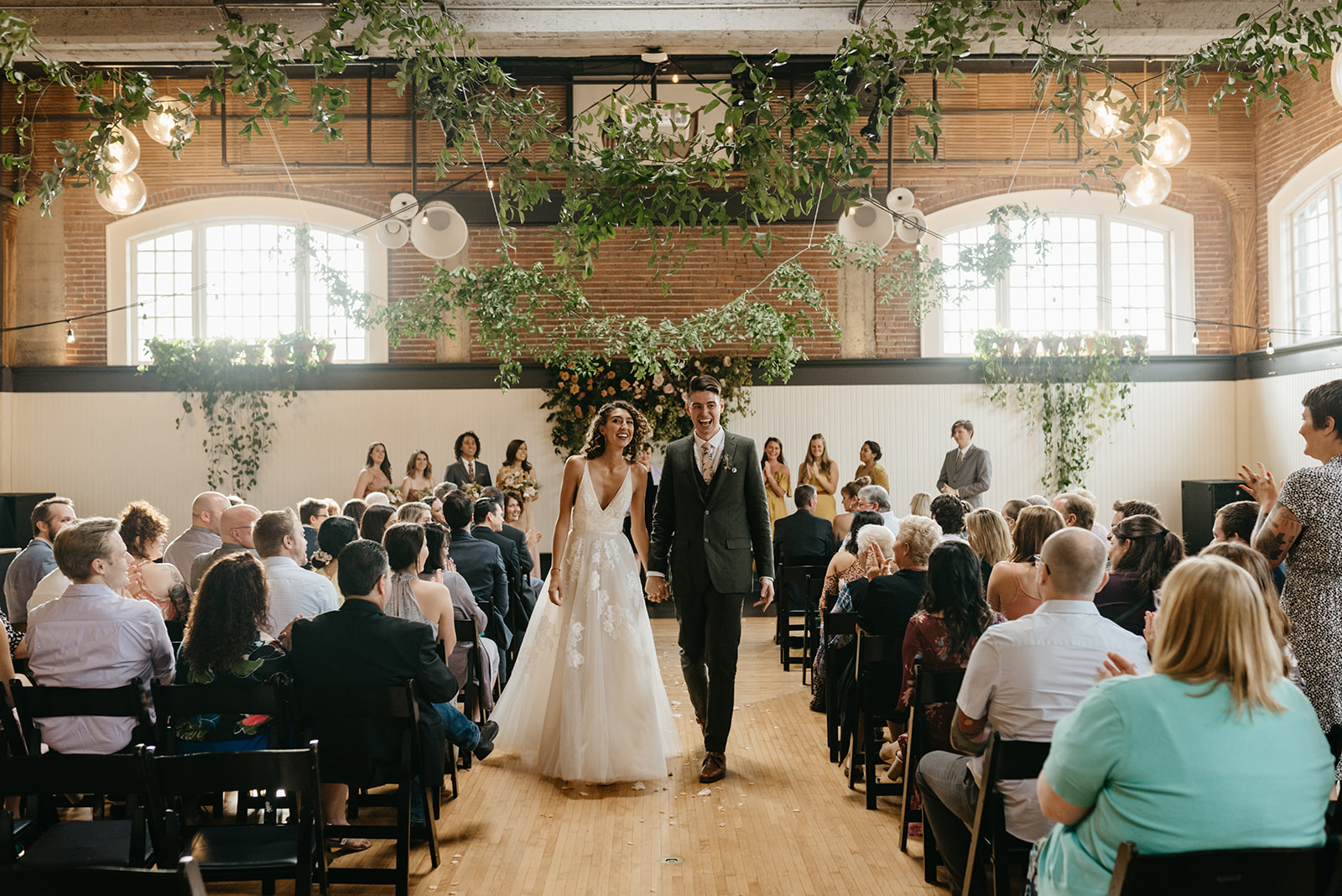 greenery covered wedding ceremony at The Evergreen Portland 