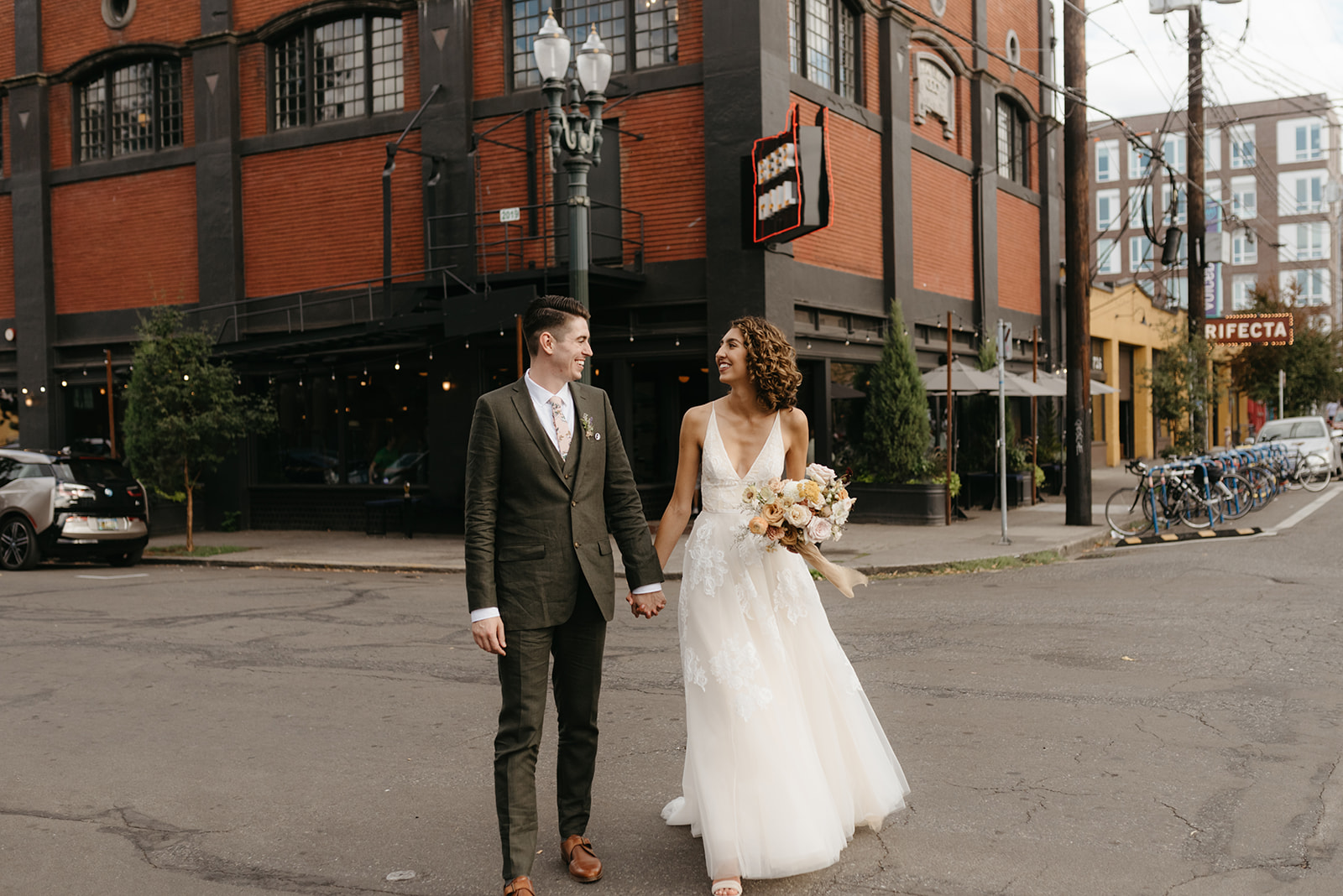 Bride and groom portrait on the street outside of wedding venue The Evergreen Portland