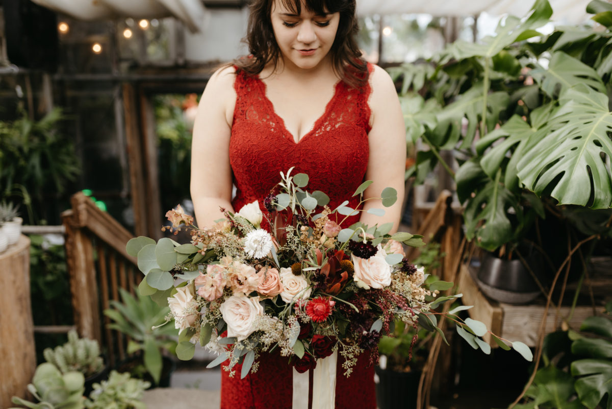 Bridal portrait at Blockhouse wedding in the nursery surrounded by plants